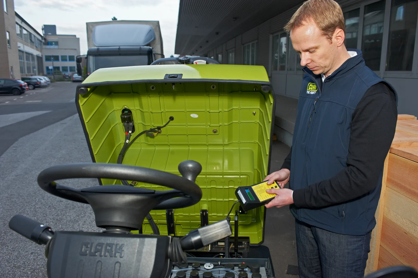 Technician servicing a forklift on site in Northern Virginia